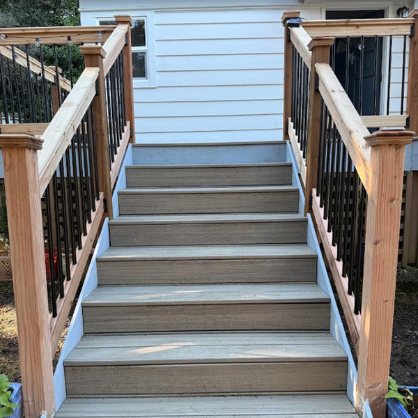 man installing insulation in house